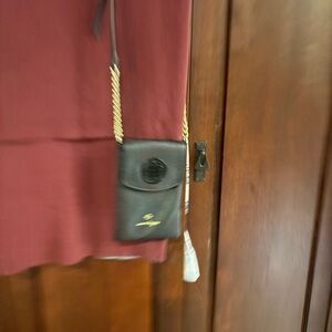 Stylish Black Leather Crossbody Bag with Gold Accents